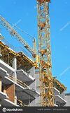 depositphotos_140793748-stock-photo-crane-and-highrise-construction-site